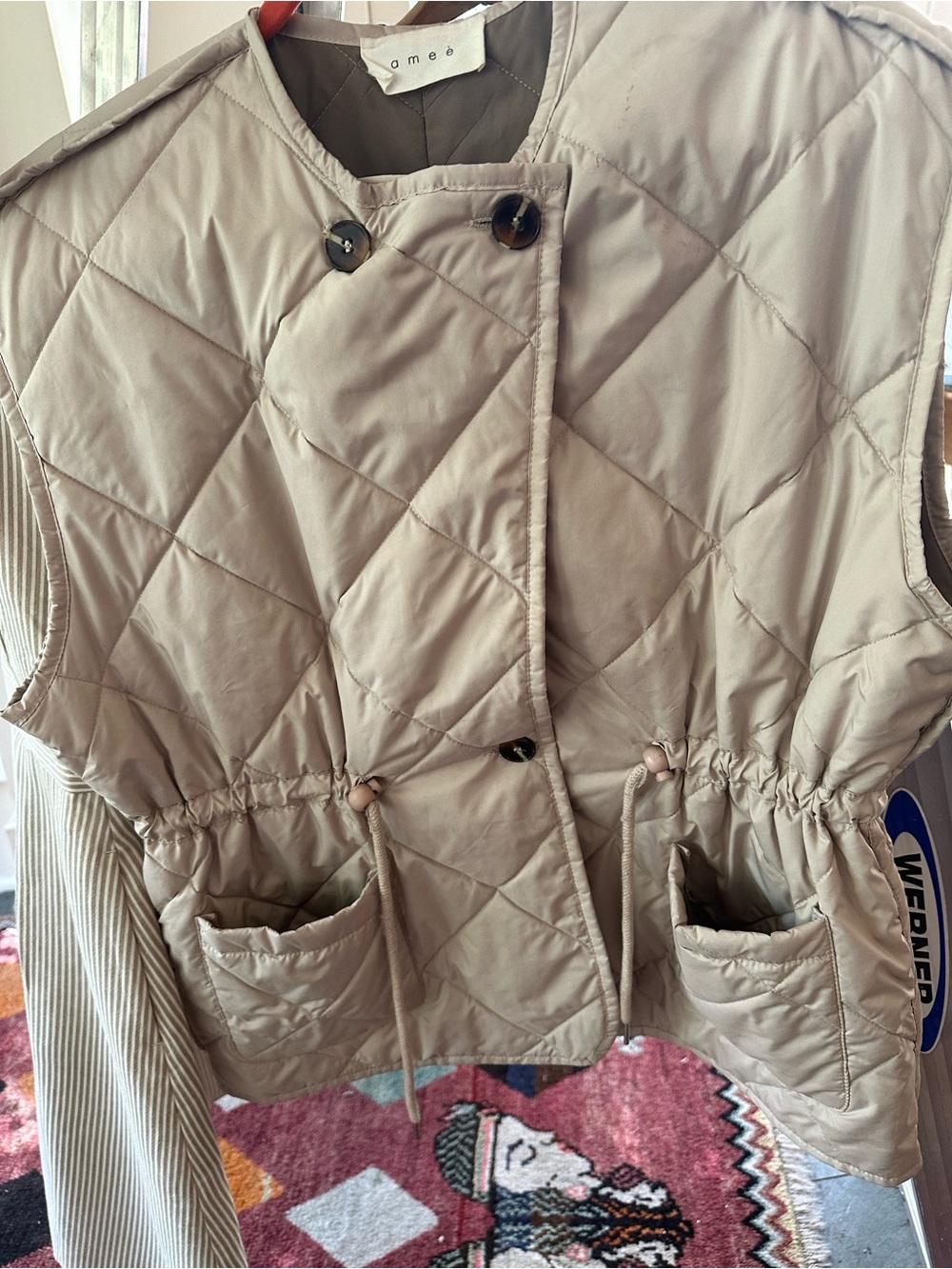 Amo Quilted Drawstring Sleeveless Vest in Taupe